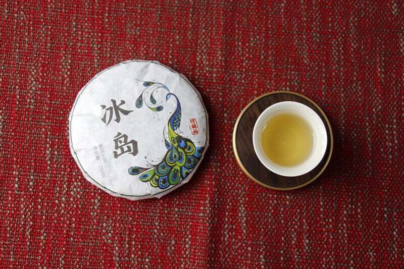 100g Yunnan Pu'er tea Icelandic raw peacock green cake seven cakes Mengku tea