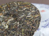 100g Yunnan Menghai He Kai Sun Green Pu-erh Raw Tea Cake Seven Seed Cake Tea
