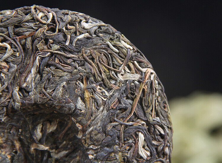 100g/cake Yunnan Pu'er raw tea cake Xigui wilderness tea Icelandic tea