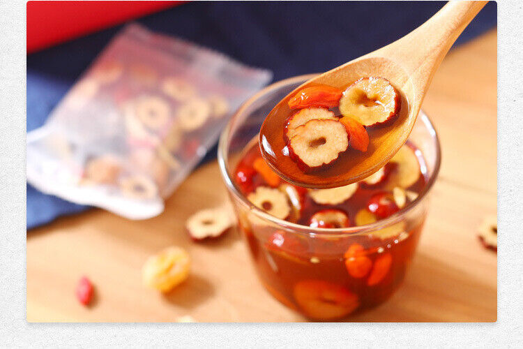 Brown sugar ginger tea longan jujube goji berry black sugar ginger jujube tea