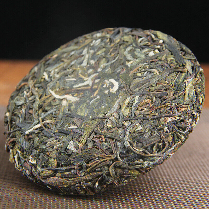 100g Yunnan Yiwu District Yiwu Sun Green Pu'er Raw Tea Cake Seven Seed Cake Tea
