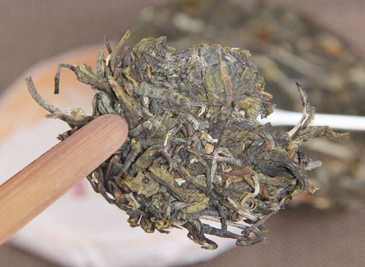 100g Yunnan Yiwu District Yiwu Sun Green Pu'er Raw Tea Cake Seven Seed Cake Tea