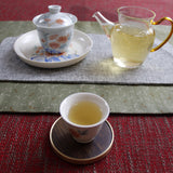 100g Yunnan Pu'er tea Icelandic raw peacock green cake seven cakes Mengku tea