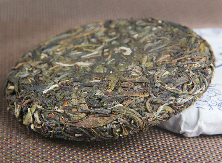 100g Yunnan Menghai He Kai Sun Green Pu-erh Raw Tea Cake Seven Seed Cake Tea