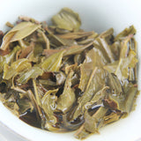 100g Yunnan Yiwu District Yiwu Sun Green Pu'er Raw Tea Cake Seven Seed Cake Tea