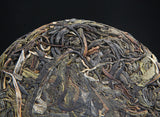 100g/cake Yunnan Pu'er raw tea cake Xigui wilderness tea Icelandic tea