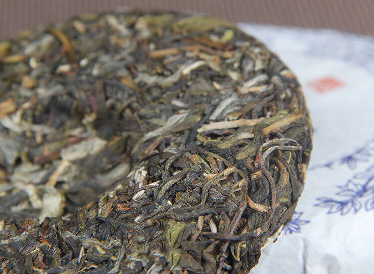 100g Yunnan Menghai He Kai Sun Green Pu-erh Raw Tea Cake Seven Seed Cake Tea