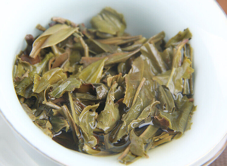 100g Yunnan Yiwu District Yiwu Sun Green Pu'er Raw Tea Cake Seven Seed Cake Tea