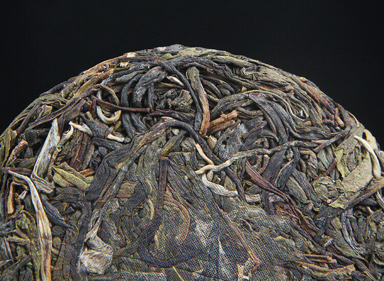 100g/cake Yunnan Pu'er raw tea cake Xigui wilderness tea Icelandic tea