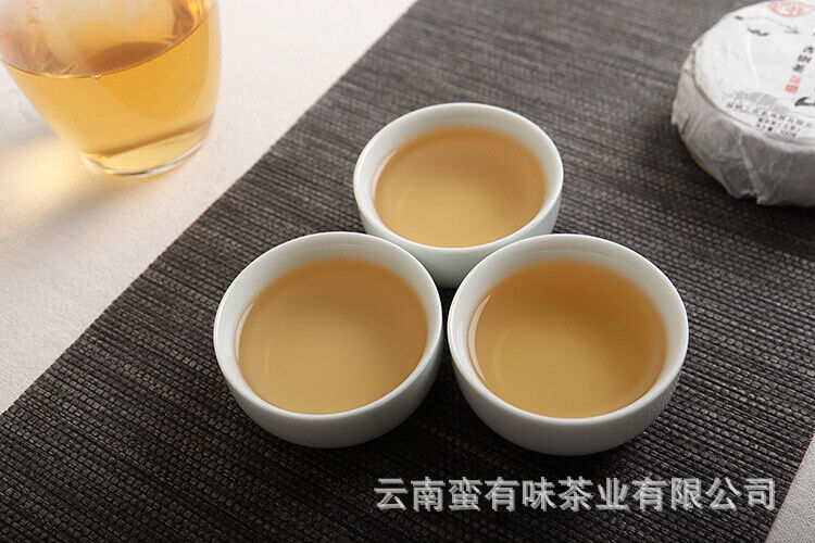 100g Pu'er Tea Le Xing Xiang Icelandic Ming Qian Spring Tea(Mooncake Shape)
