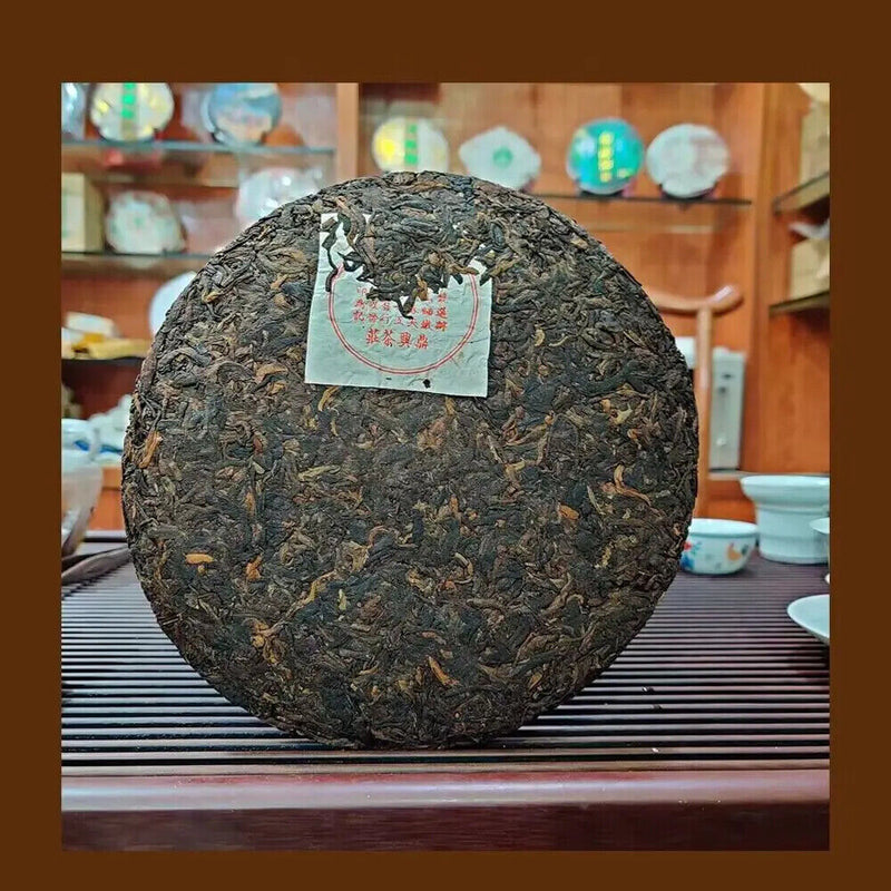 Chinese Yunnan Ripe Puer Tea Cake 357 Gram Dingxing Old Fermented Tea Cake