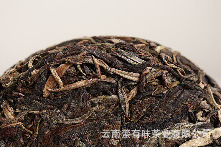 100g Pu'er Tea Le Xing Xiang Icelandic Ming Qian Spring Tea(Mooncake Shape)