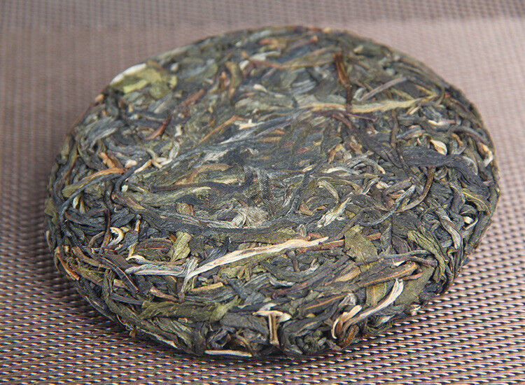 100g/cake Yunnan Pu'er raw tea cake Xigui wilderness tea Icelandic tea