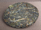 100g/cake Yunnan Pu'er raw tea cake Xigui wilderness tea Icelandic tea