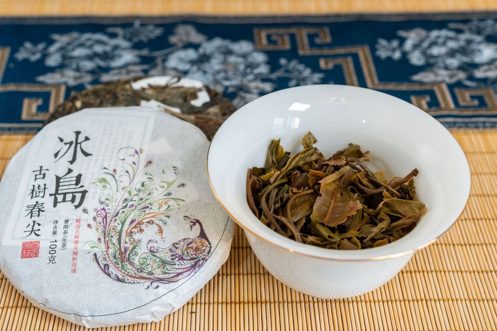 100g Pu'er Raw Tea Iceland Yunnan Ancient Tea Spring Tea Cake Orchid Fragrance