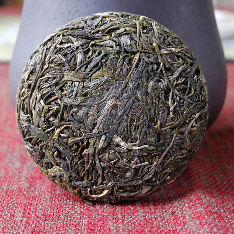 100g Yunnan Pu'er tea Icelandic raw peacock green cake seven cakes Mengku tea