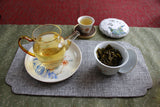 100g Yunnan Pu'er tea Icelandic raw peacock green cake seven cakes Mengku tea