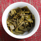 100g Yunnan Pu'er tea Icelandic raw peacock green cake seven cakes Mengku tea