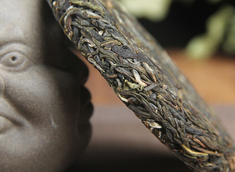 100g/cake Yunnan Pu'er raw tea cake Xigui wilderness tea Icelandic tea