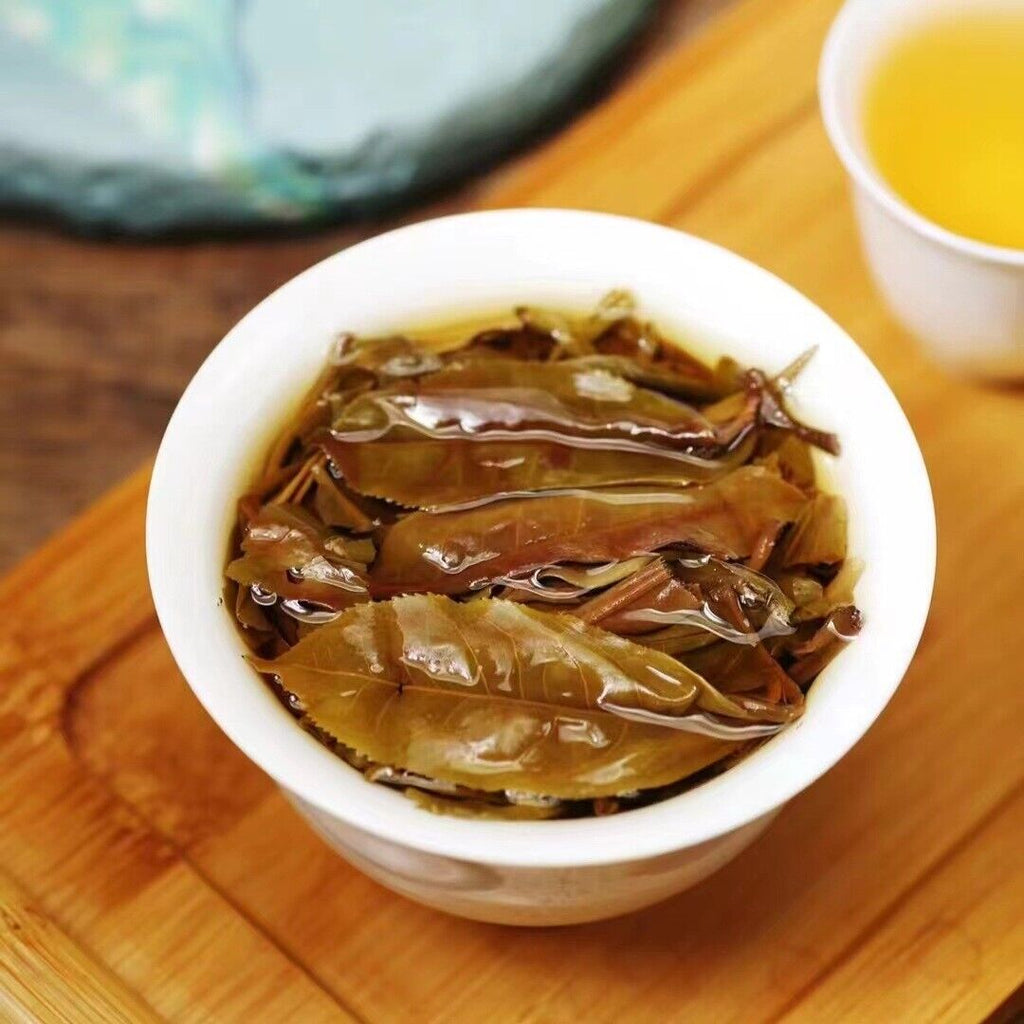 Yunnan  Tea Nannuo Mountain Half Slope Old Cottage Pu'er Raw Cake Tea 200g