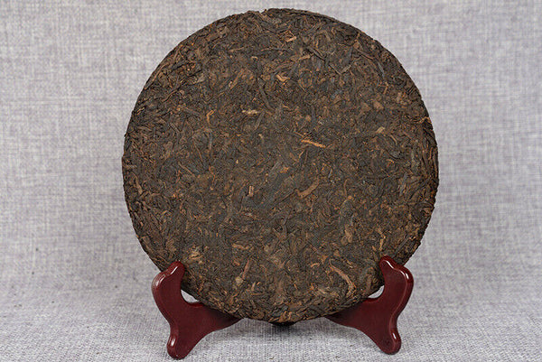 357 g Yunnan deep mountain wild flavor cooked cake seven sub cake Pu'er tea