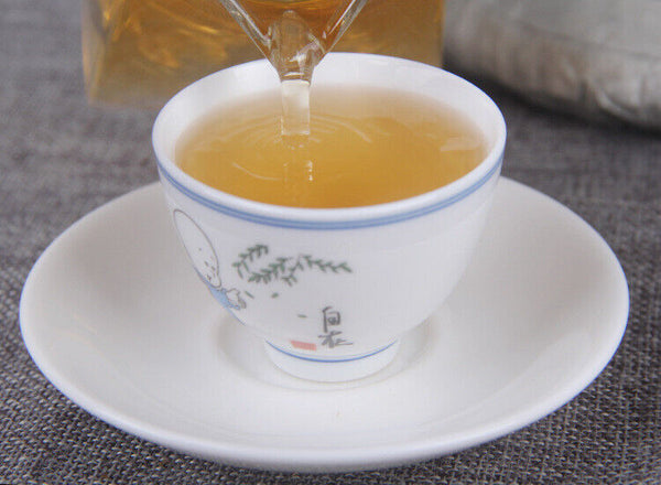 357g Yunnan Pu'er Raw Tea Seven Seed Cake Tea Leaves Lincang Iceland Gold Leaf