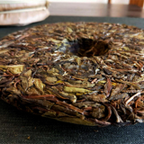 357g Pu'er raw tea golden leaves golden Mengku yellow slices, seven seed cakes