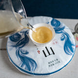 357g DaXueshan Pu'er Raw Tea Yunnan First Spring Ancient Seven Seed Cake Tea
