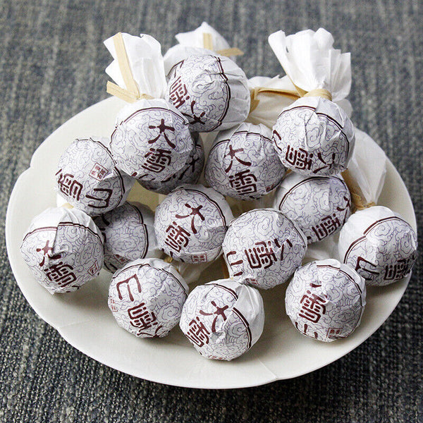 Thé Pu'er du Yunnan Lincang Daxueshan thé mûr thé de Cologne 500g