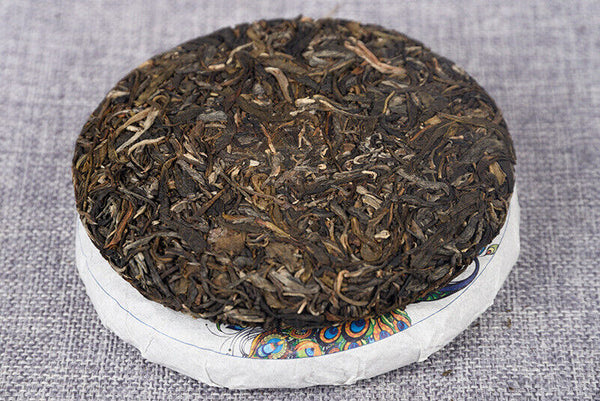 Yiwu Raw Tea 200g Raw Tea Cake Yunnan Ancient Tree Healthy Drink