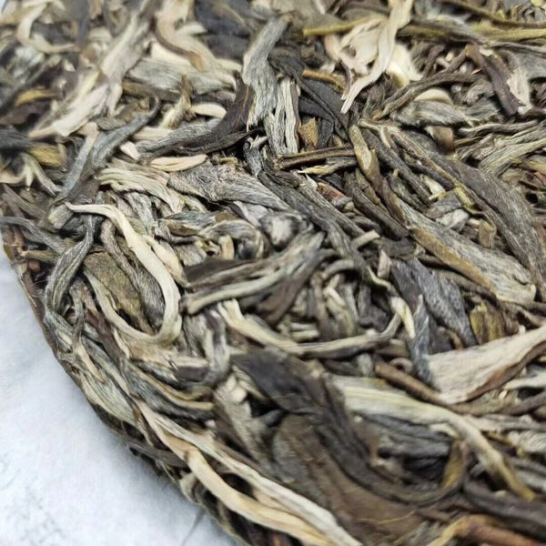 Yunnan Pu'er Tea He Kai Raw Tea Ancient Tree First Spring Pu'er Tea 357g