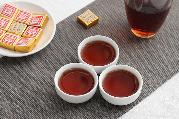Menghai Pu'er ripe tea small square brick tea leaves sinensis word Pu'er tuocha