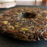 357g Pu'er raw tea golden leaves golden Mengku yellow slices, seven seed cakes