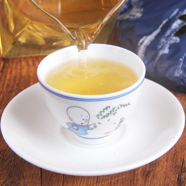 357g Menghai Bada Mountain Arbor Tea Green Tea Yunnan Pu'er Tea Cake
