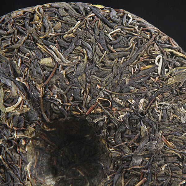 Iceland tree raw tea cake spring tea pure sweet new teaMengku pure tea Pu-erh