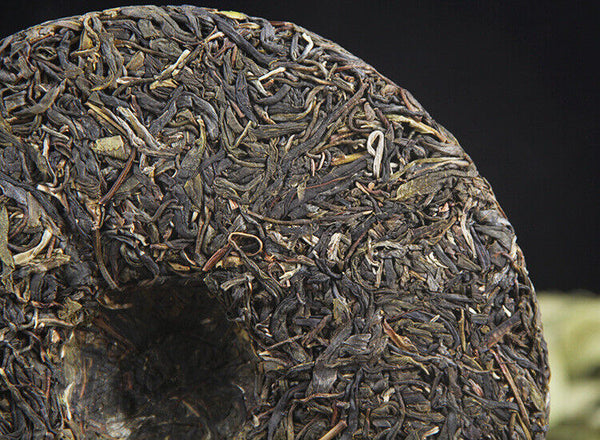 Icelandic raw tea cake spring tea pure sweet Mengku Pu'er seven seed cake tea