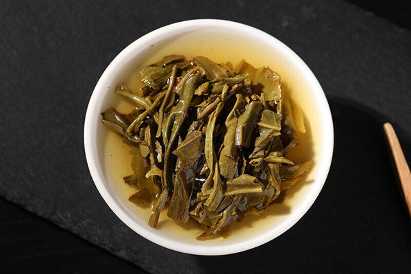 Yunnan Pu'er Tea Yiwu Ancient Tree 357g Pu'er Raw Tea Cake with Orchid Aroma