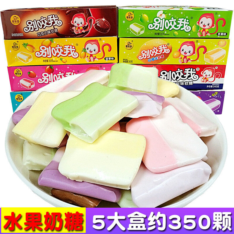 Delicious children's snacks, loose sweets, milk, and fruit candies