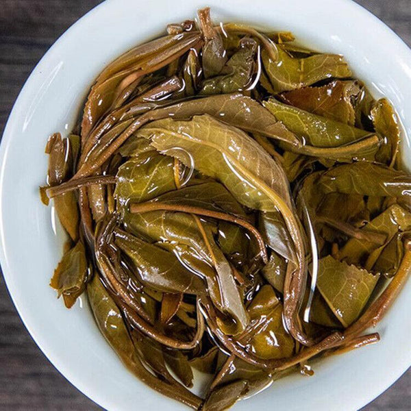 Yunnan - Special Grade Fengfengzhai Ancient Tree Pu'er Seven Seed Cake 357g
