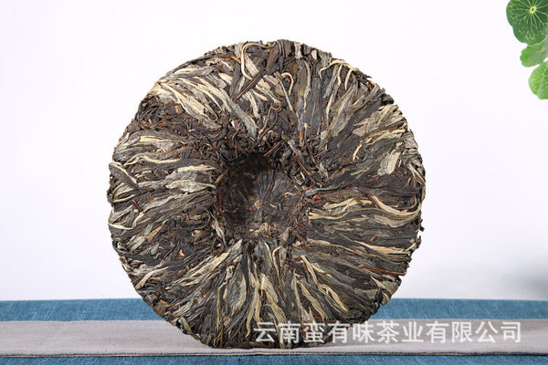 357g Yunnan Pu'er tea leaves Menghai Da Shu tea Putzi tea cake Pu'er raw tea