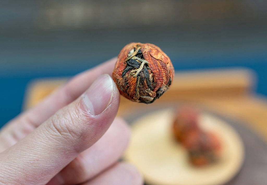 Yunnan Fengqing work black tea handmade dragon pearl small gold ball Dian Hong
