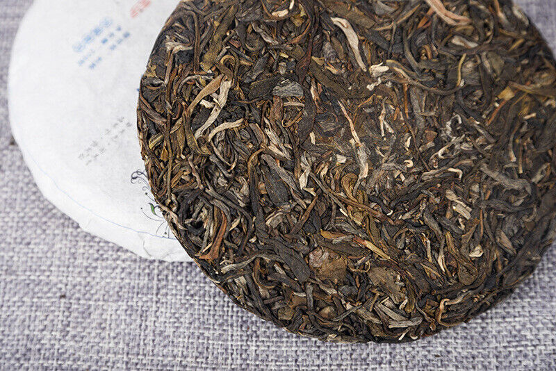 Yiwu Raw Tea 200g Raw Tea Cake Yunnan Ancient Tree Healthy Drink
