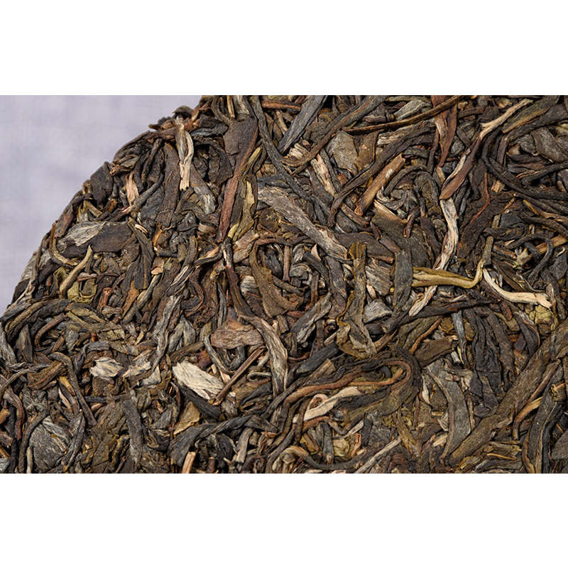 Fenghuang Wo Seven Seeds Cake Spring Tea Tea Cake 357 Organic Green Tea Yiwu