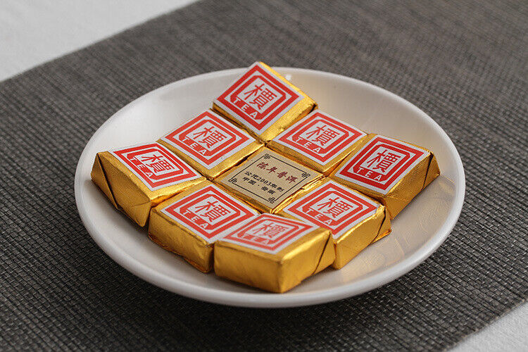 Menghai Pu'er ripe tea small square brick tea leaves sinensis word Pu'er tuocha