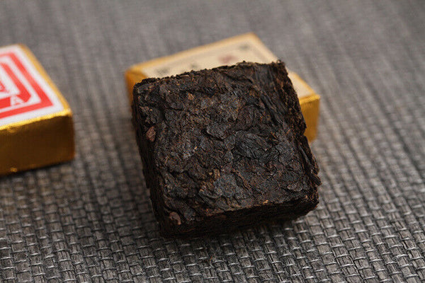 Menghai Pu'er ripe tea small square brick tea leaves sinensis word Pu'er tuocha