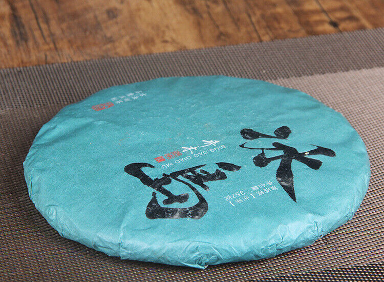 Iceland tree raw tea cake spring tea pure sweet new teaMengku pure tea Pu-erh