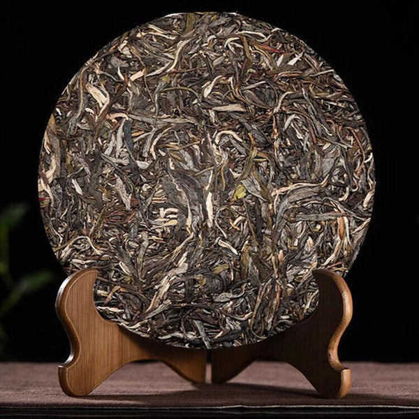 Yunnan - Special Grade Fengfengzhai Ancient Tree Pu'er Seven Seed Cake 357g