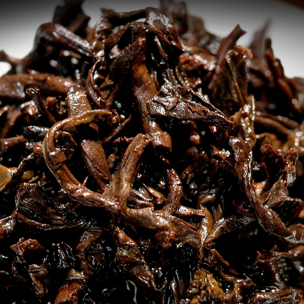 357g Yiku Xigui First Spring Ancient Large Leaf Seeds Aged Pu'er Ripe Cake Tea