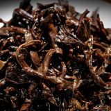 357g Yiku Xigui First Spring Ancient Large Leaf Seeds Aged Pu'er Ripe Cake Tea