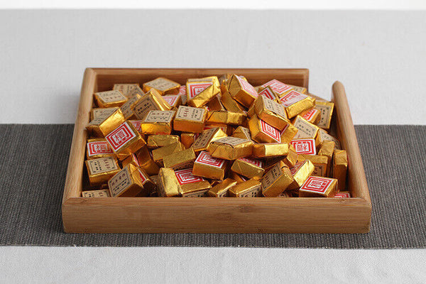Menghai Pu'er ripe tea small square brick tea leaves sinensis word Pu'er tuocha